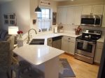 Fully Equipped Kitchen with bar top